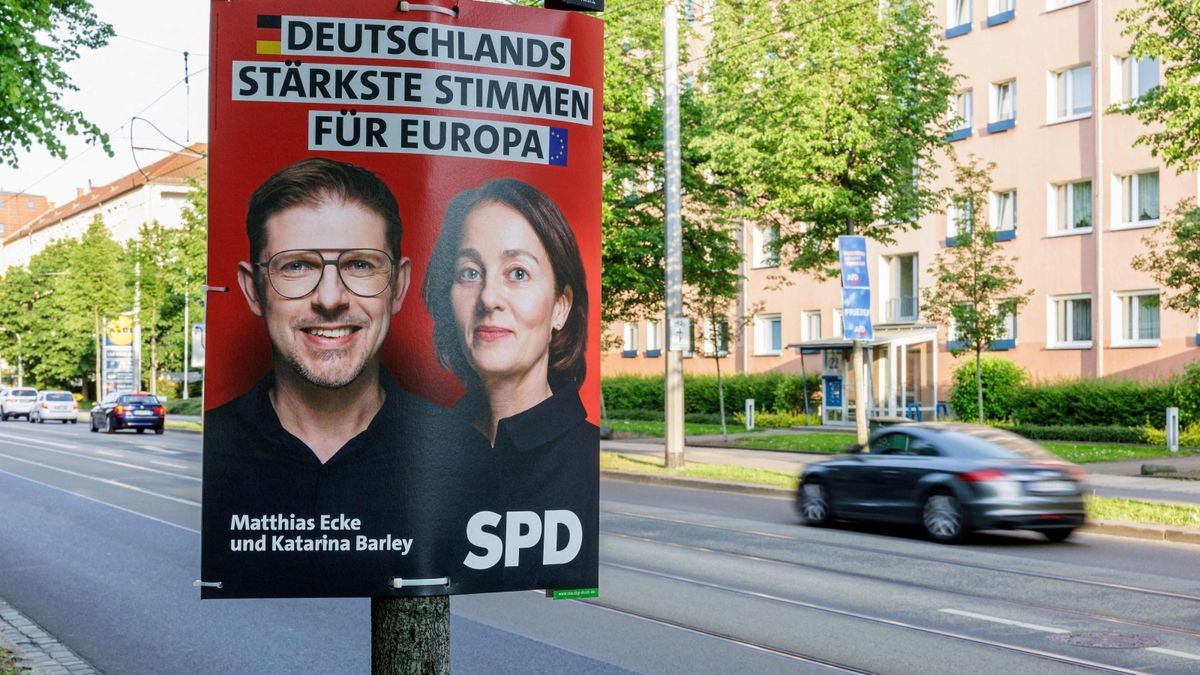 An election poster showing Germany's Social Democratic Party SPD lead candidates Matthias Ecke (L) and Katarina Barley for the upcoming European Parliament elections is seen attached to a lamp post along Schandauer Strasse in the city district Striesen of Dresden, eastern Germany on May 4, 2024. German Chancellor Scholz on May 4 condemned an attack on one of his party's European Parliament deputies as a 