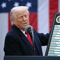 US President Donald Trump holds a chart as he delivers remarks on reciprocal tariffs during an event in the Rose Garden entitled Trump delivers remarks on reciprocal tariffs