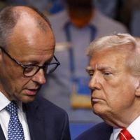 Germany's Chancellor Friedrich Merz (L) speaks with US President Donald Trump before the start of the North Atlantic Council plenary meeting at the North Atlantic Treaty Organisation (NATO) summit in The Hague on June 25, 2025. (Photo by Ludovic MARIN / POOL / AFP) (Photo by LUDOVIC MARIN/POOL/AFP via Getty Images) NETHERLANDS-NATO-SUMMIT-DEFENCE-DIPLOMACY