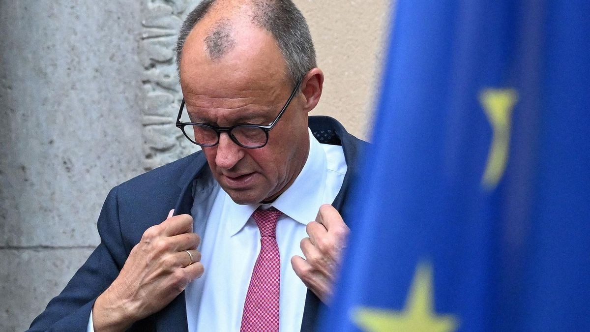 German Chancellor Friedrich Merz arrives to meet with the French President for talks at Villa Borsig, guesthouse of the German Foreign Ministry, in Berlin on July 23, 2025. (Photo by RALF HIRSCHBERGER / AFP)