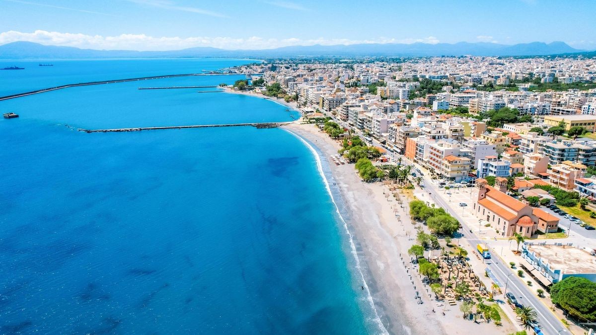 Kalamata Marina port. Aerial photo of Kalamata city, blue long beach in Messenia, Peloponnese, Greece