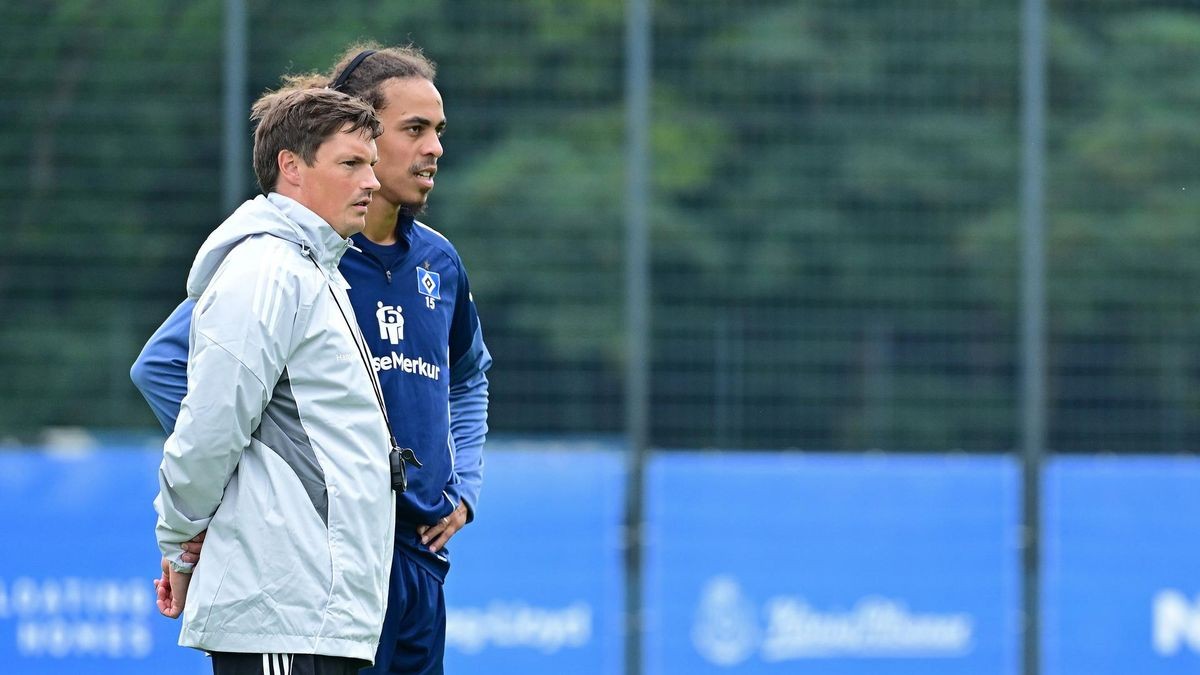 Merlin Polzin und HSV-Stürmer Yussuf Poulsen.